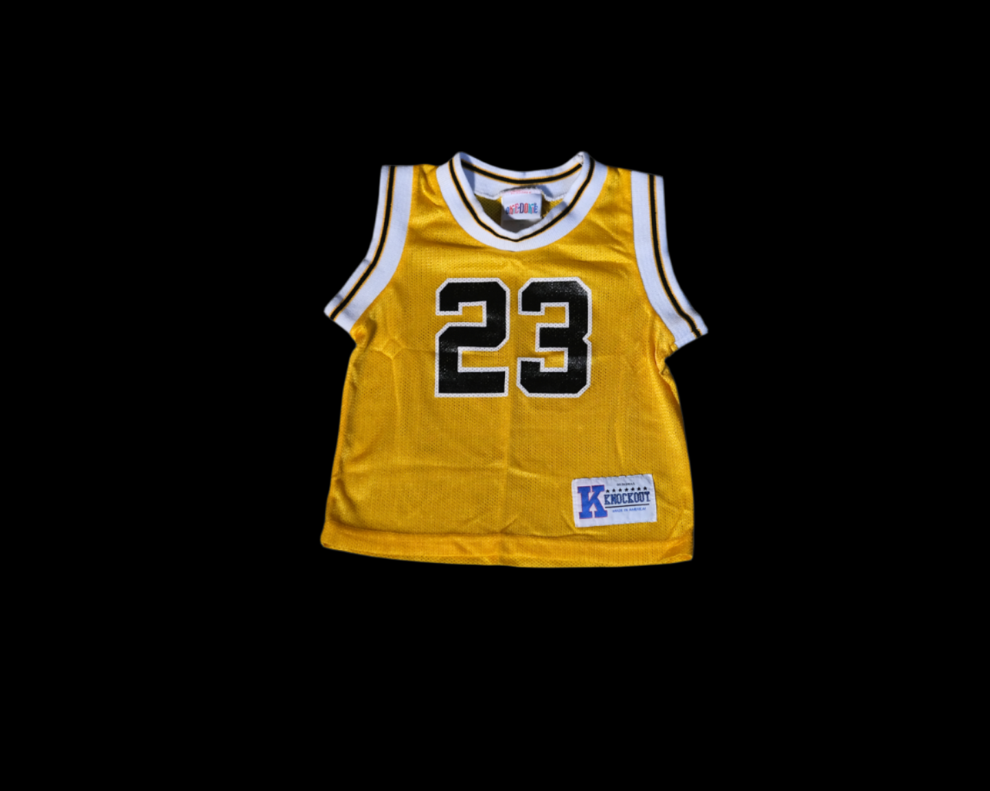 Yellow basketball jersey with number 23 on a white background