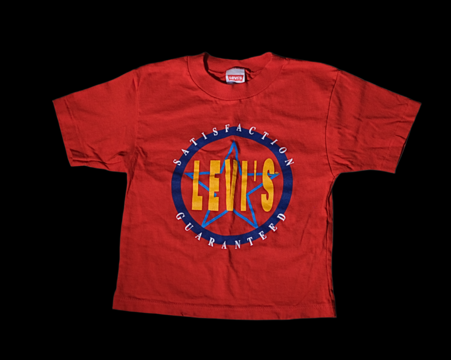 White t-shirt with red accents on a black background